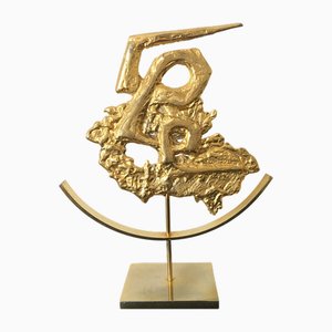 Philippe Cheverny, Scultura con zodiaco Capricorno, metallo fuso dorato, anni '50