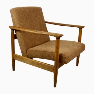 Poltrona GFM-142 color oro arancione di Edmund Homa, anni '70