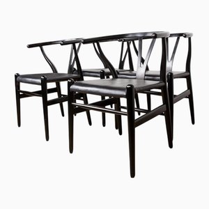 Danish Model CH 24 Wishbone Chairs in Black Lacquered Wood and Leather by Hans Wegner for Carl Hansen, 1960s, Set of 4