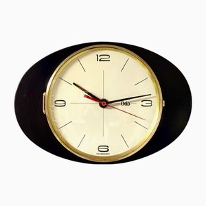 Mid-Century Wall Clock in Black Formica and Brass from Odo, France, 1960s