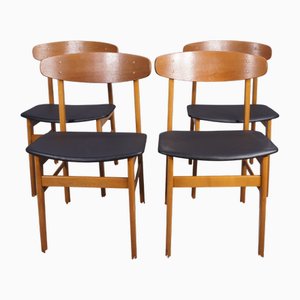 Sedie da pranzo in teak e faggio con sedili in similpelle, anni '50, set di 4