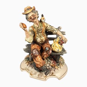 Vintage Ceramic Sculpture of Seated Merchant from Capodimonte, 1960s