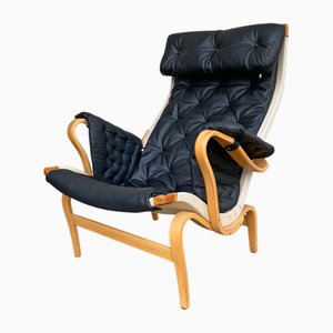 Poltrona Pernilla in faggio e pelle nera di Bruno Mathsson per Dux, anni '70