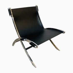 Sedia a forbice di P. Tuttle & A. Citterio per Flexform, anni '80