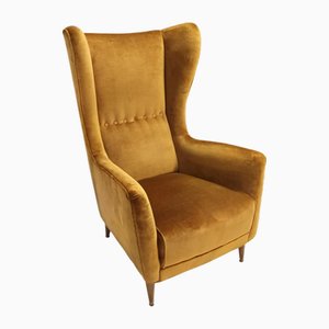 Model 437 Dark Goldenrod Wingback Armchair by Gio Ponti for Cassina, 1950s