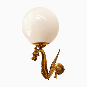 Applique Dragon in ottone con sfera in vetro