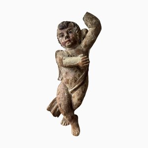 Querubín de madera policromada del siglo XVII