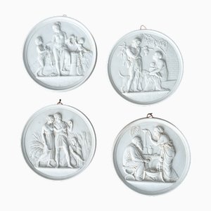 Bertel Thorvaldsen, Medallones que representan las cuatro edades del hombre, década de 1800, porcelana bisque. Juego de 4