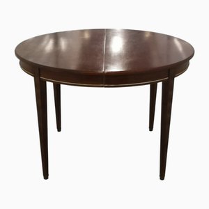 Mesa de comedor redonda de madera