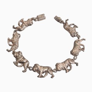 Pulsera vintage de plata con leones, años 70