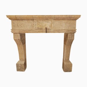 20th Century Provincial Limestone Fireplace Mantle with Arched Legs