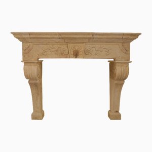 20th Century Carved Limestone Fireplace Mantle with Scrolled Corbels and Foliate