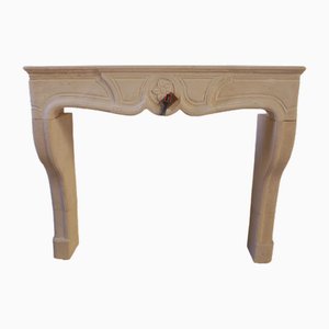 20th Century French Louis XV Limestone Fireplace with Floral Medallion