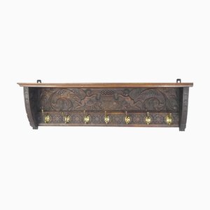 Antique French Carved Oak Wall Rack with Angel Figure and Brass Hook
