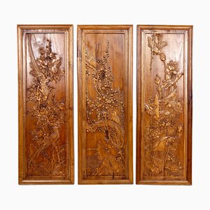 Paneles de madera tallada con decoraciones florales y animales, Indochina / Vietnam, de principios del siglo XX. Juego de 3