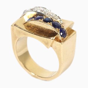 Anillo tanque de diamantes con zafiro