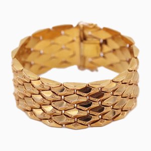 Brazalete grande de oro de 18 kt