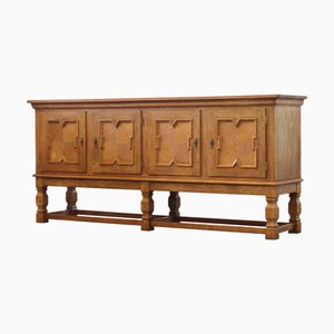 Mid-Century Low Cabinet in Oak in the style of Henning Kjærnulf, 1960s