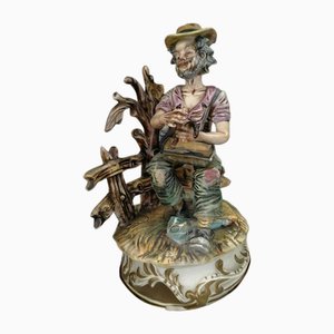 Statue of Man with Broken Umbrella from Capodimonte