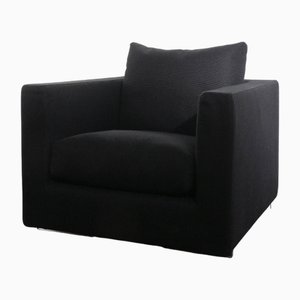 Butaca Magnum de tela negra de Flexform