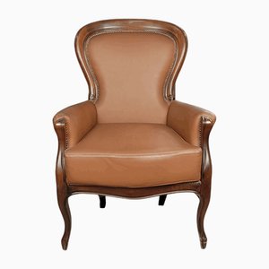 Fauteuil en Cuir et Noyer
