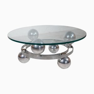 Mesa de centro Sputnik de metal cromado con esferas y superficie redonda de vidrio, Alemania, años 60