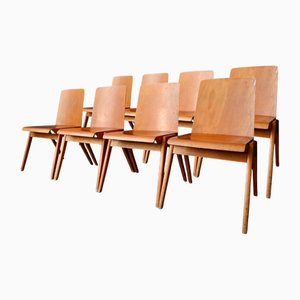 Sillas apilables escandinavas vintage de madera con patas de compás. Juego de 8