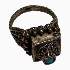 Anillo Poison histórico de plata con turquesa, década de 1900