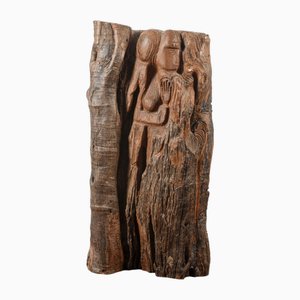 Schnitzskulptur auf Stamm von Adele Gigli