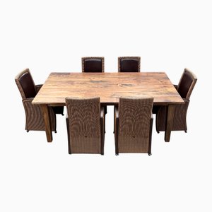 Juego de comedor con sillas de roble y cuero. Juego de 7