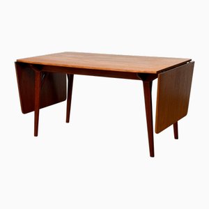 Mesa de comedor de teca con extensiones abatibles, años 50-60