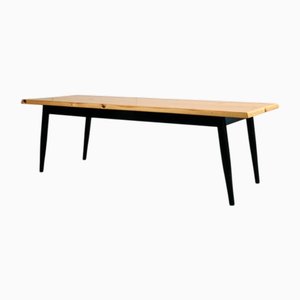 Mesa larga de pino canadiense con patas barnizadas en negro
