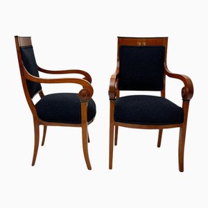 Poltrone Biedermeier in ciliegio con bouclé nera, 1820