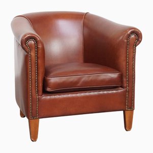 Sillón Club de cuero de vaca con clavos decorativos