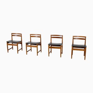 Sillas de comedor Mid-Century modernas de teca y cuero sintético, años 60. Juego de 4