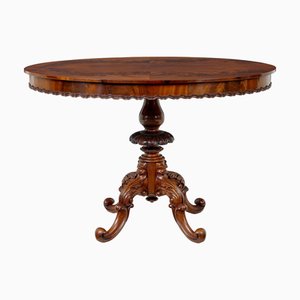 19th Century Carved Flame Mahogany Oval Center Table, 1890s