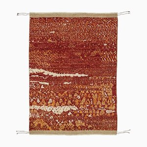 Moderner roter Tribal Teppich
