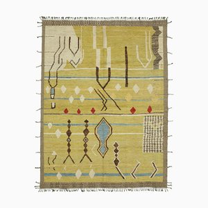 Moderner gelber Tribal Teppich