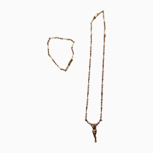 Collar y pulsera con el Cristo de San Juan de la Cruz según Salvador Dali. Juego de 2