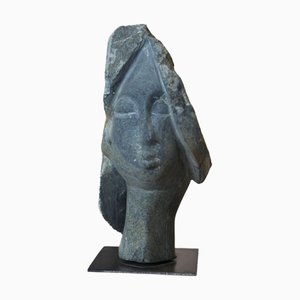 Rizimu Chiwawa, Testa Scultura, Pietra