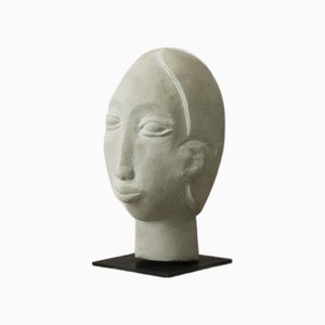 Rizimu Chiwawa, Testa Scultura, Pietra
