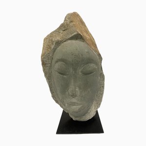 Rizimu Chiwawa, Testa Scultura, Pietra