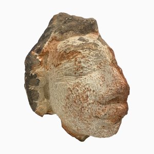 Rizimu Chiwawa, Testa Scultura, Pietra