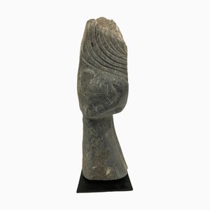 Rizimu Chiwawa, Testa Scultura, Pietra
