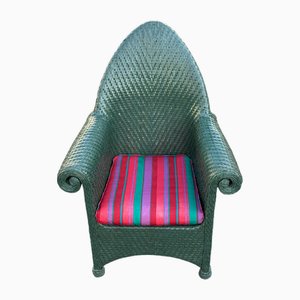Silla estilo vintage de mimbre verde