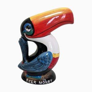 Salvadanaio in ceramica Guinness Toucan Beer nello stile di John Gilroy