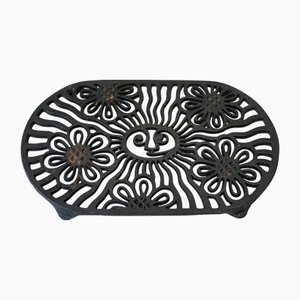 Dessous de plat en fonte à motif mystique