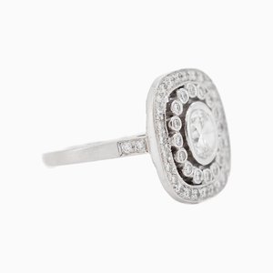 Anillo de compromiso Art Déco con doble halo en platino y diamantes