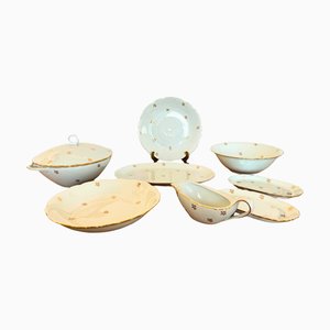 Juego de vajilla francés de porcelana con bordes dorados para 12 de Limoges, 1956. Juego de 31