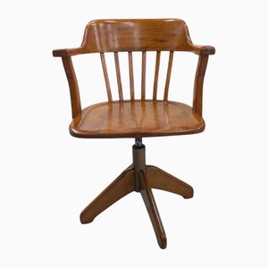 Silla giratoria de nogal, años 80
